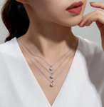 layered lafonn solitaire necklaces on female