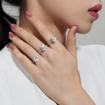 three single row solitaire engagement rings on hand