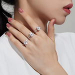 three single row solitaire engagement rings on hand