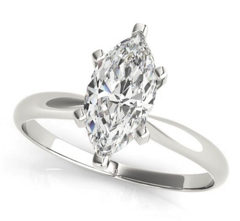 white gold solitaire engagement ring with a marquise diamond