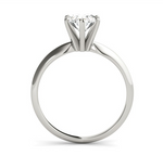 white gold solitaire engagement ring with an oval diamond