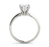 white gold solitaire engagement ring with an oval diamond
