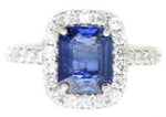 white gold blue sapphire and diamond halo  ring